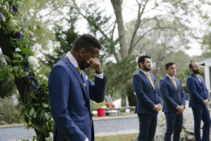 wedding ceremony groom crying